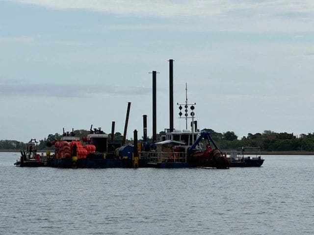 Passing another dredging operation (day shapes easier to see).