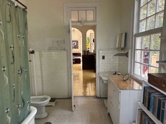 Hemingway’s bathroom as it was. The writing on the wall is his weight. He would record it daily.